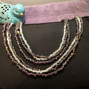 3 Strands of aurora borealis puca bead necklaces